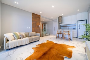 Apartamento | Área de estar | Smart TV 50 polegadas com canais digitais