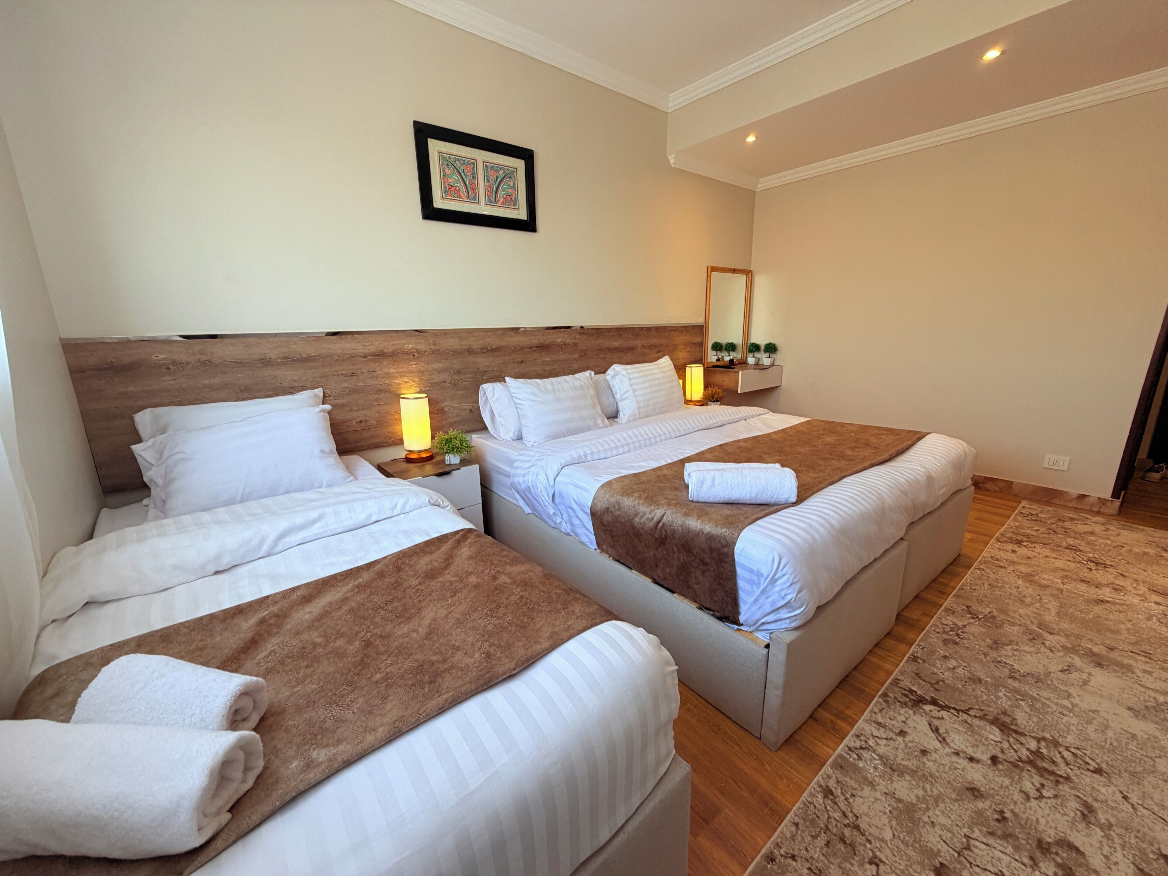 Superior Triple Room, Patio, City View | Laptop workspace, blackout drapes, soundproofing, iron/ironing board