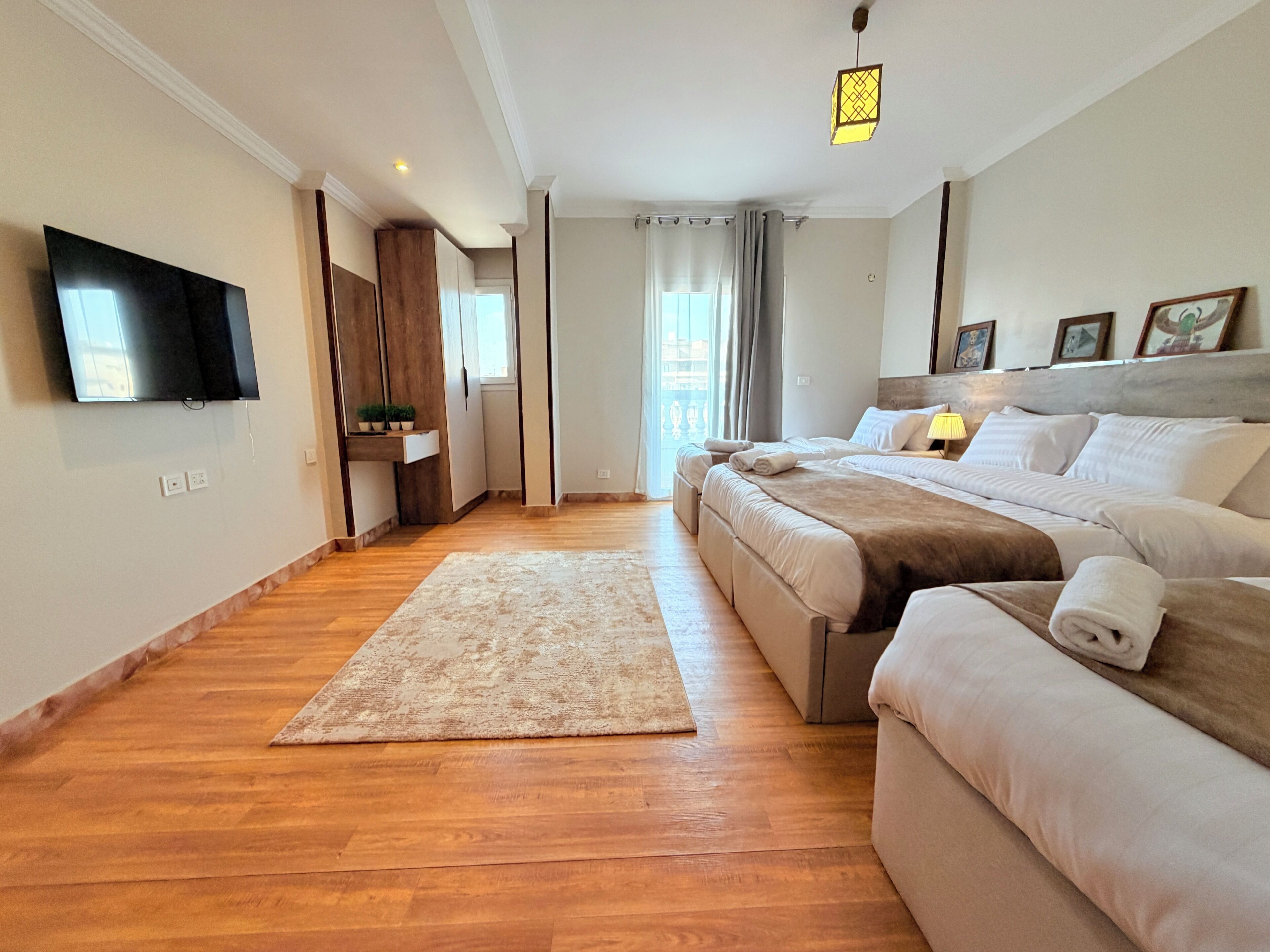 Family Suite, City View | Laptop workspace, blackout drapes, soundproofing, iron/ironing board
