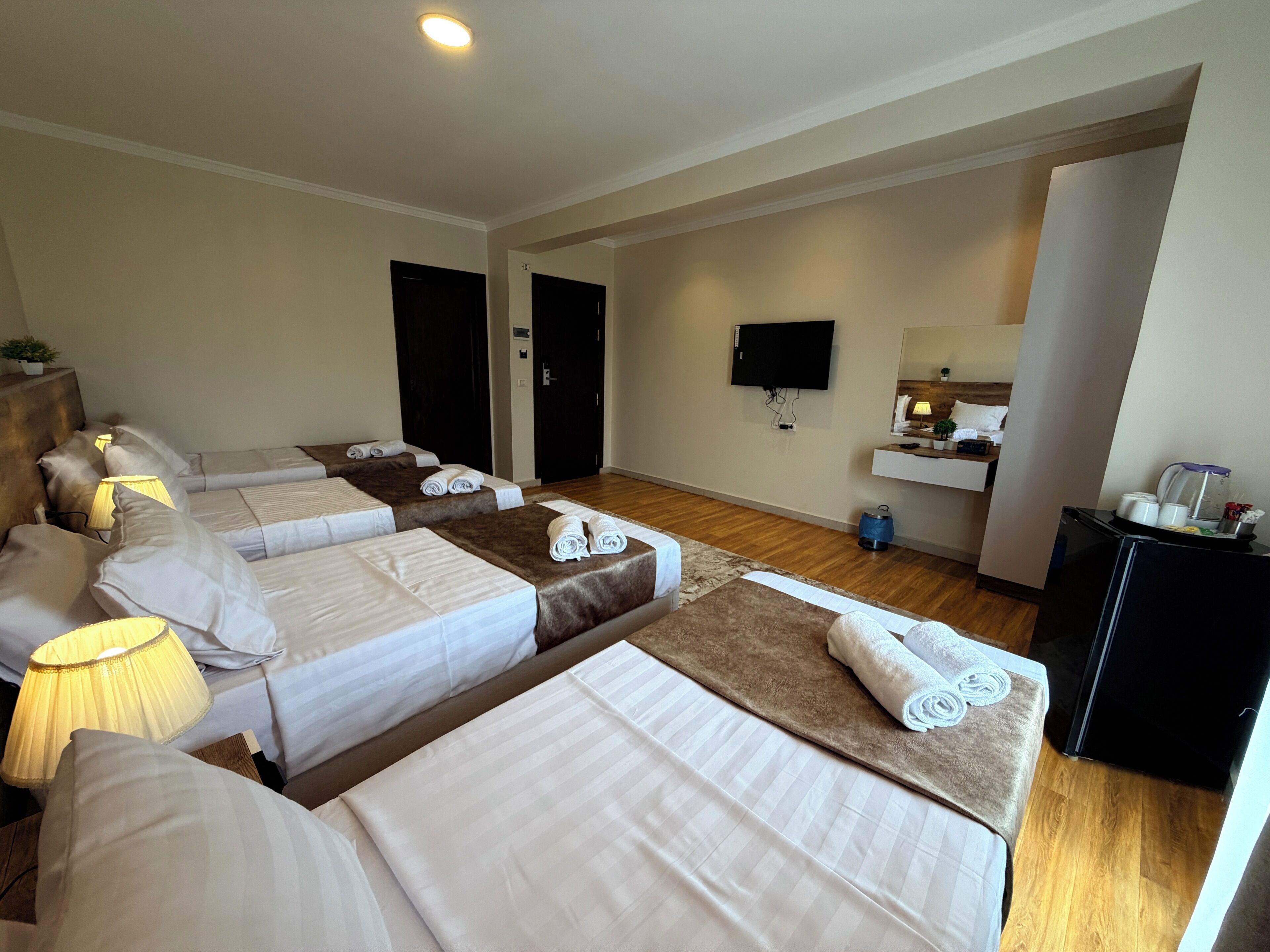 Family Quadruple Room, Patio, Mountain View | Laptop workspace, blackout drapes, soundproofing, iron/ironing board