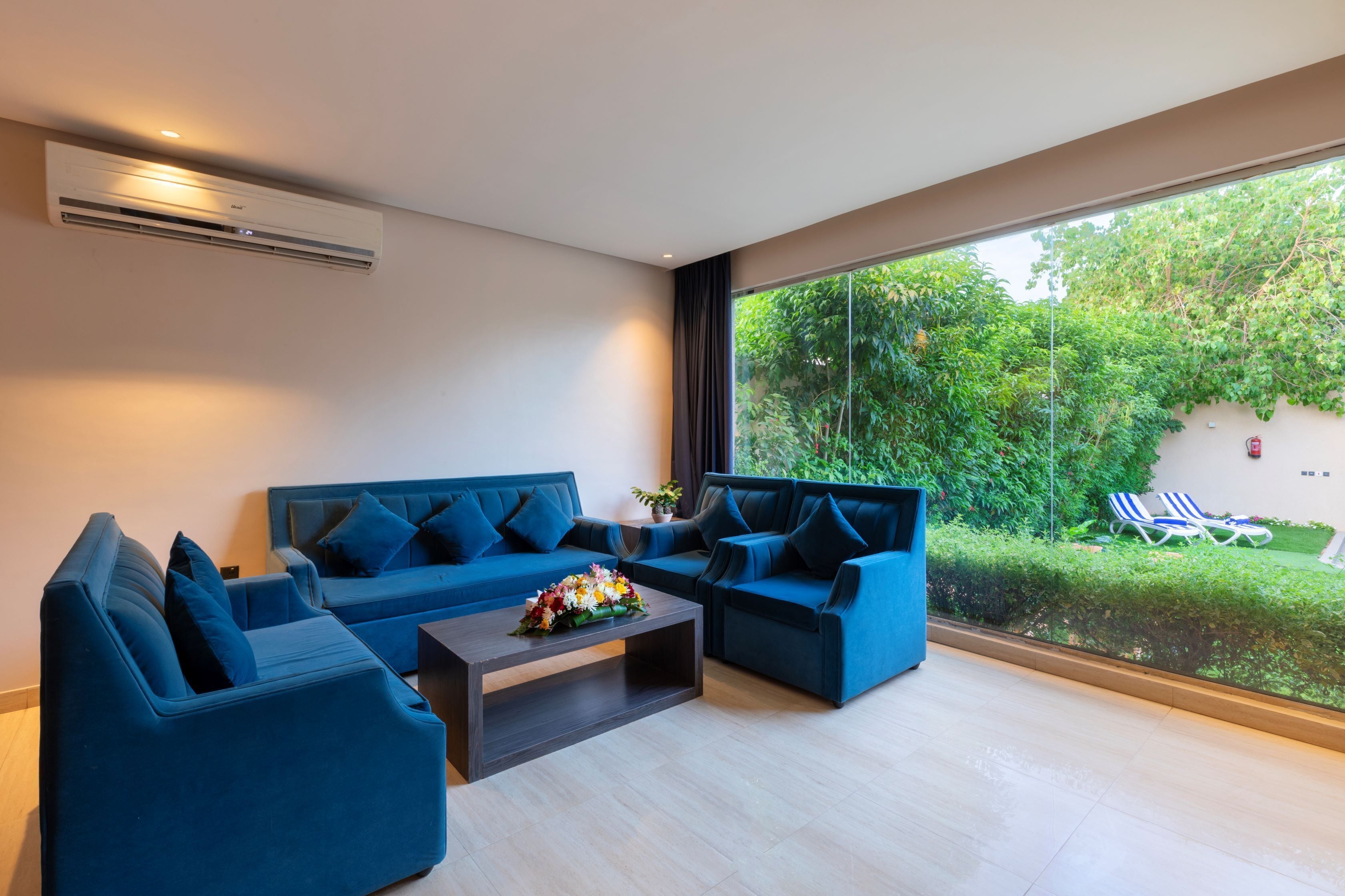 Deluxe-chalet, lanai, näköala puutarhaan | Oleskelualue