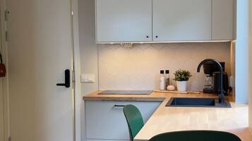 Departamento panorámico, vista al mar | Cocina privada | Frigobar y lavavajillas