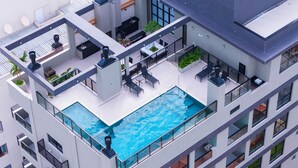 Un bâtiment moderne doté d’une piscine sur le toit, d’espaces de détente en plein air et de nombreux balcons.