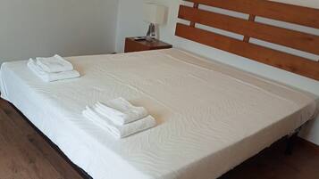 Family House, Balcony, Mountain View | Individually furnished, bed sheets