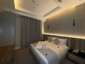 Luksussuite | Blendingsgardiner, strykejern/-brett og wi-fi (inkludert)