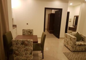 Deluxe Studio Suite | Ruang tamu