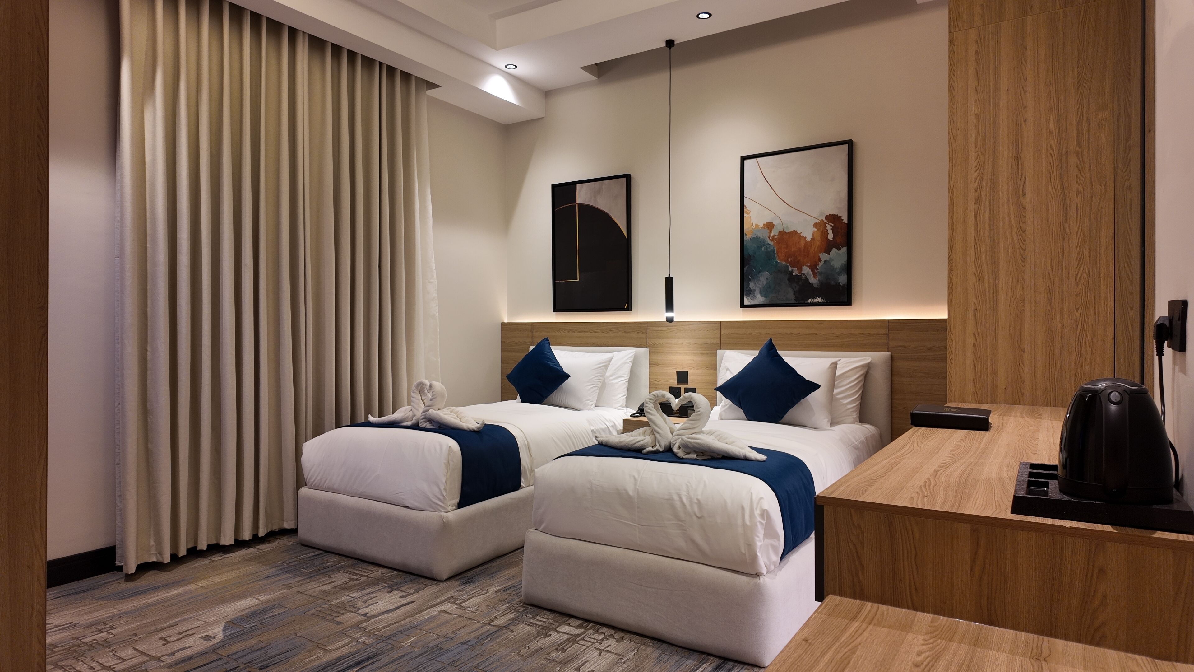 Premium bedding, pillow-top beds, free minibar items, blackout curtains