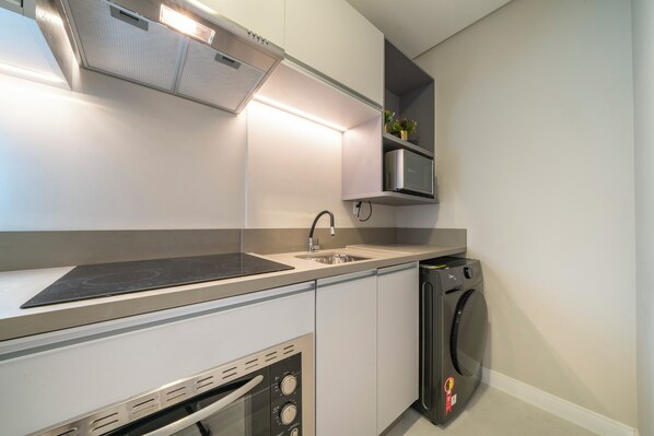 Family Apartment, Balcony, City View | Laundry - Aluguel flat alto padrão com piscina (Bombinhas)