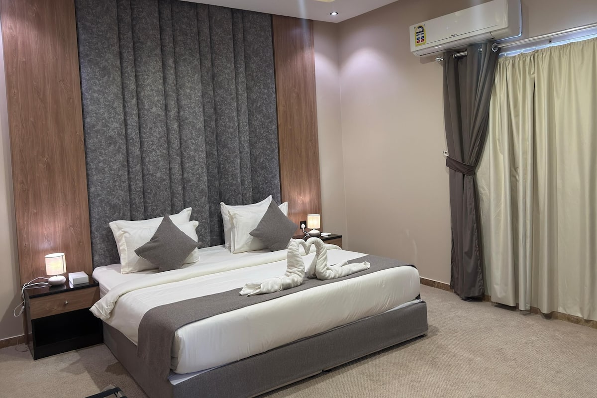 Deluxe suite | Verduisterende gordijnen, gratis wifi