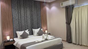 Deluxe Suite | Blackout drapes, free WiFi