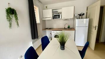 Fridge, microwave, coffee/tea maker, electric kettle