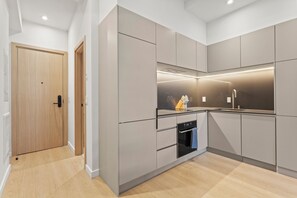 Fridge, dishwasher, cookware/dishes/utensils, dining tables - Ori Breeze Studio - Studio Apartment, Sleeps 2 (Montreal)