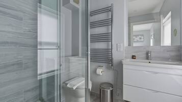 Hair dryer, towels, soap, toilet paper