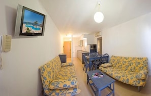 Living area - Playa Bella Beach Apartments (Sant Josep de sa Talaia)