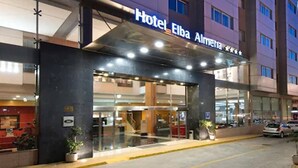 Hotel Elba Almería with a modern entrance, glass doors, and a visible reception area. - Elba Almeria Business & Convention Hotel (Almeria)