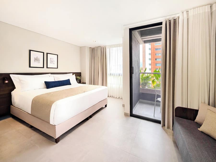 Deluxe Suite, Balcony | In-room safe, desk, blackout curtains, iron/ironing board