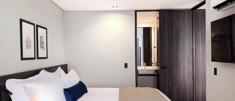 Family Suite, Balcony | In-room safe, desk, blackout drapes, iron/ironing board