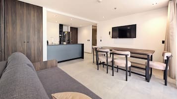 Family Suite, Balcony | In-room safe, desk, blackout drapes, iron/ironing board