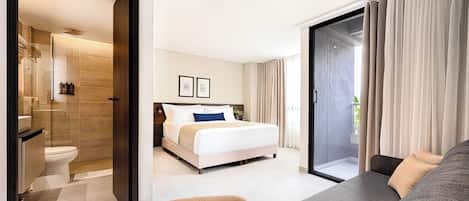 Deluxe Suite, Balcony | In-room safe, desk, blackout drapes, iron/ironing board