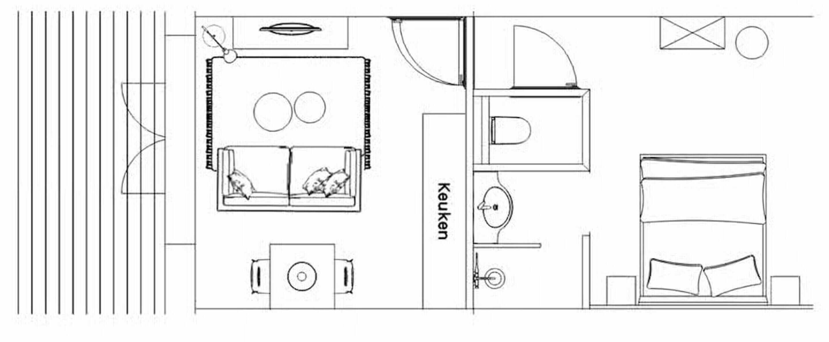 Ein Grundriss mit einer Küchenzeile, einem Badezimmer, einem Bett und einem Fenster.