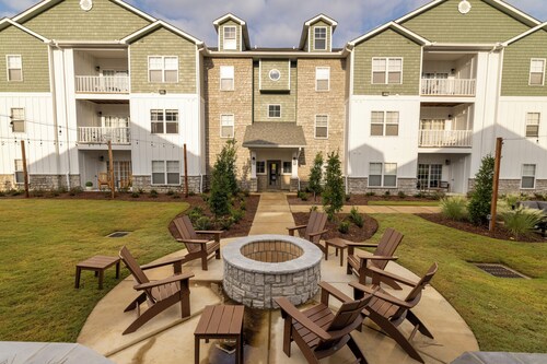 New Listing! Brand New 3 bedroom 3 1/2 bath condo on the edge of campus!