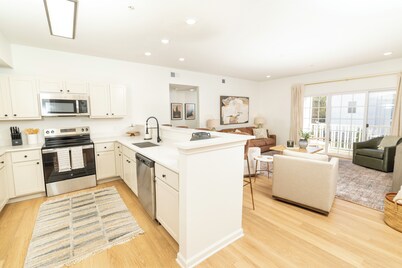 New Listing! Brand New 3 bedroom 3 1/2 bath condo on the edge of campus!