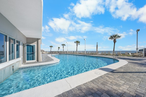 A heated pool - Tradewinds 1106 🌊 Gulf-Front Retreat | Balcony Views + Swim-Through Pool (Orange Beach)