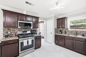 Fridge, microwave, oven, stovetop - 4-BD/2-BA with Backyard Pool Retreat + Game Room (Lancaster)