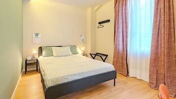 1 chambre, fer et planche Ă repasser, Wi-Fi, draps fournis