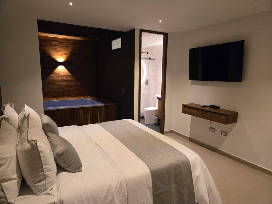 Habitación doble Deluxe | Ropa de cama de alta calidad, wifi gratis y ropa de cama