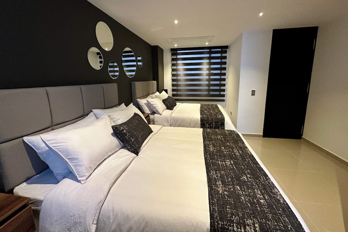 Vierbettzimmer | Hochwertige Bettwaren, kostenloses WLAN, Bettwäsche