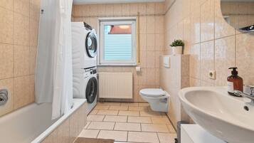 Hair dryer, towels, soap, toilet paper