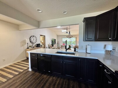 Walk to Brownwood Paddock Square, Golf cart included, open floor plan w/ updates