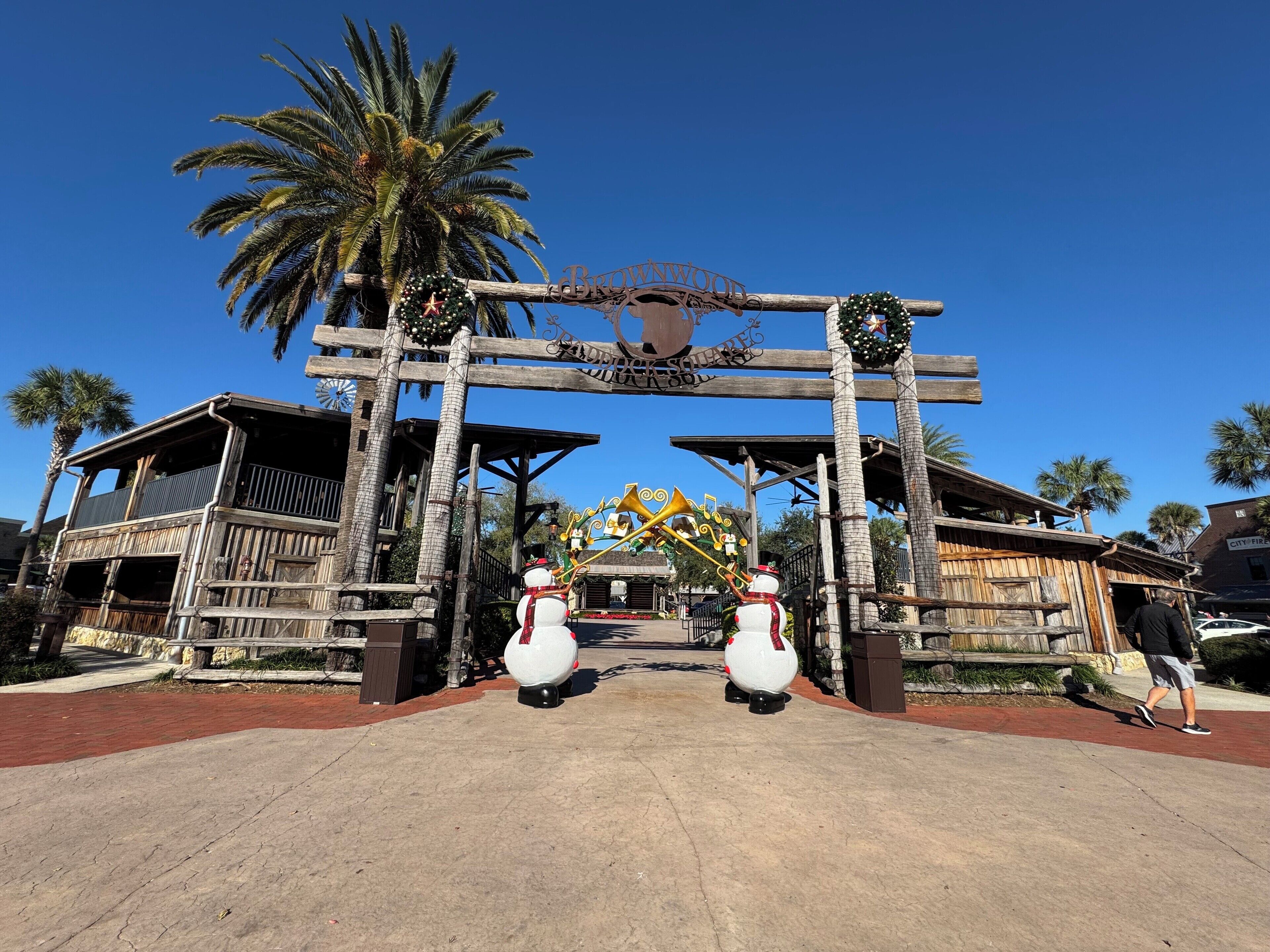 A wooden archway with a sign reading "BROWNINGWOOD" and "CITY FIRE STATION".