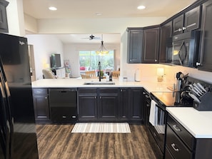 Fridge, microwave, oven, stovetop - Walk to Brownwood Paddock Square, Golf cart included, open floor plan w/ updates (The Villages)