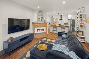 Smart TV, fireplace, books