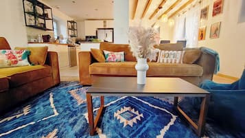 Smart TV, fireplace, table football, books