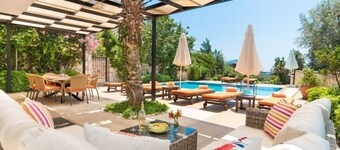 Family friendly villa in Kalkan. Large pool & secluded gardens. 4 bedrooms.