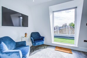 Basic-Apartment, Stadtblick | Wohnbereich
