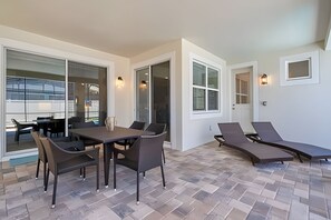 Outdoor dining - Modern 6BR Villa w/ Pool & Resort Access (Kissimmee)