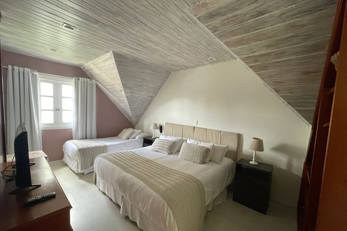 Triple Room, Courtyard View | In-room safe, blackout drapes, free WiFi