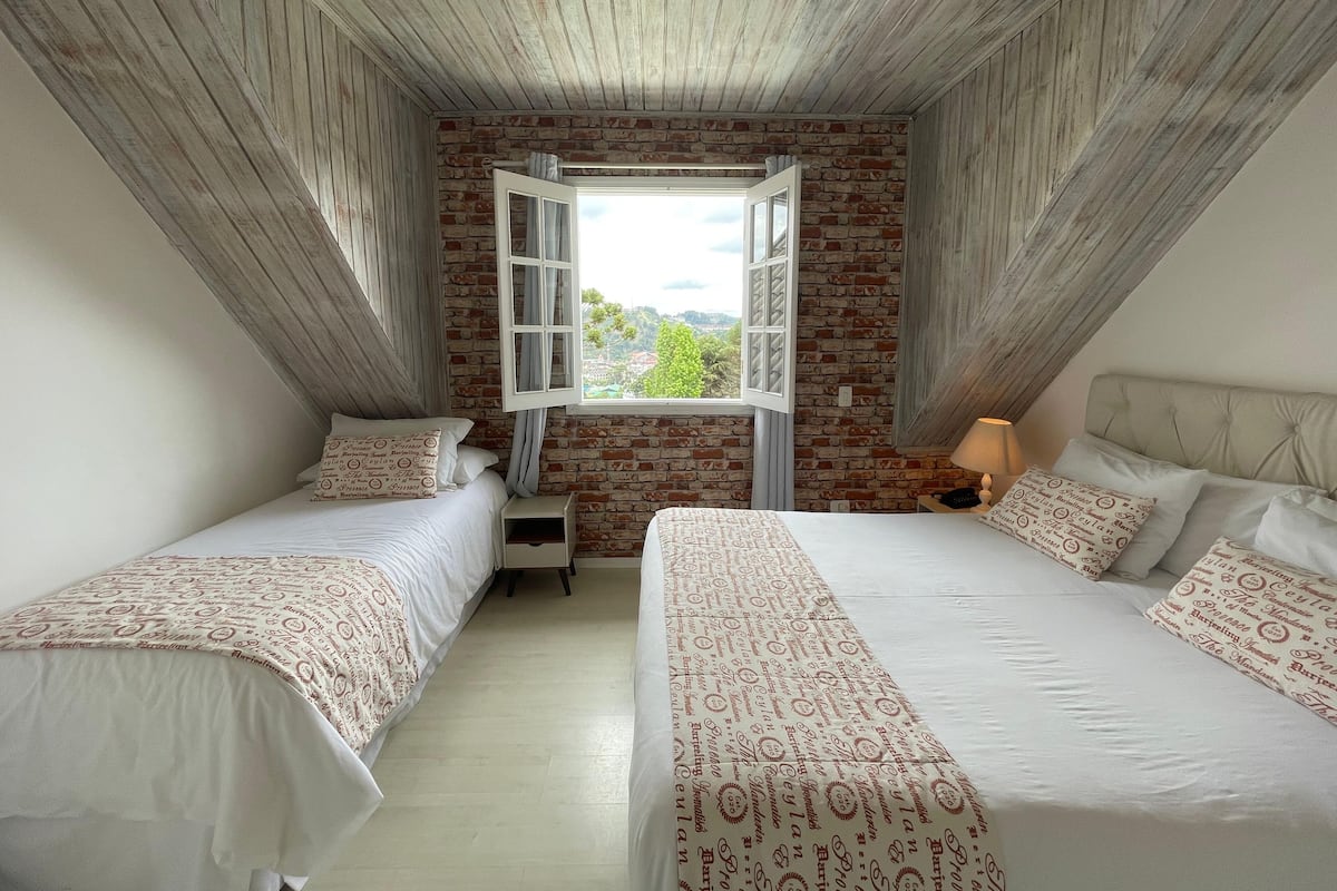 Deluxe Triple Room, City View | In-room safe, blackout drapes, free WiFi