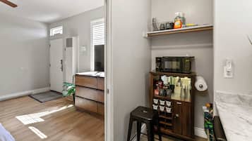 Fridge, microwave, coffee/tea maker, toaster