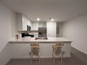 Fridge, microwave, oven, stovetop - New Home in New Community Near Downtown Houston (Houston)