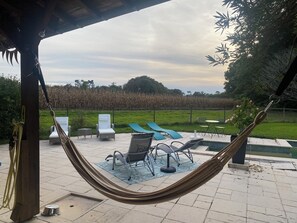 Terrace/patio - Charming Gîte in the heart of the Landes (Goos)