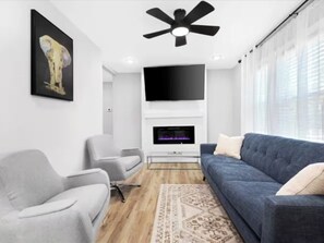 TV, fireplace - Fireplace • Private Fenced Yard • Free Parking (Atlanta)