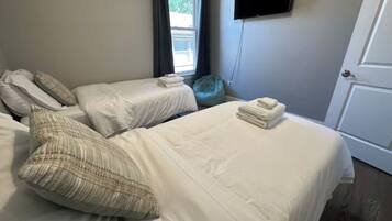 Iron/ironing board, travel crib, WiFi, bed sheets