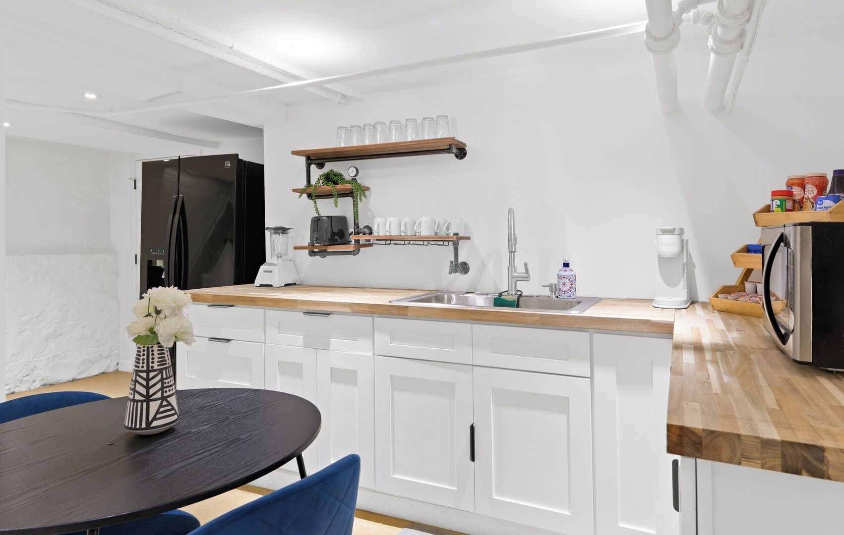 Fridge, microwave, coffee/tea maker, toaster