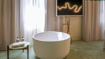 Shower, eco-friendly toiletries, hair dryer, bathrobes