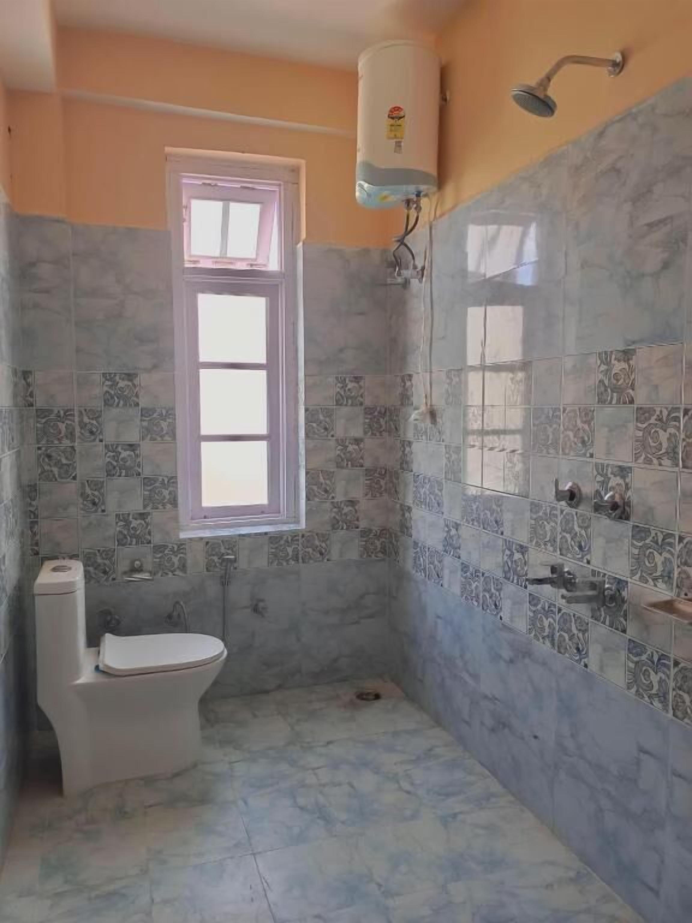 Shower, free toiletries, slippers, towels